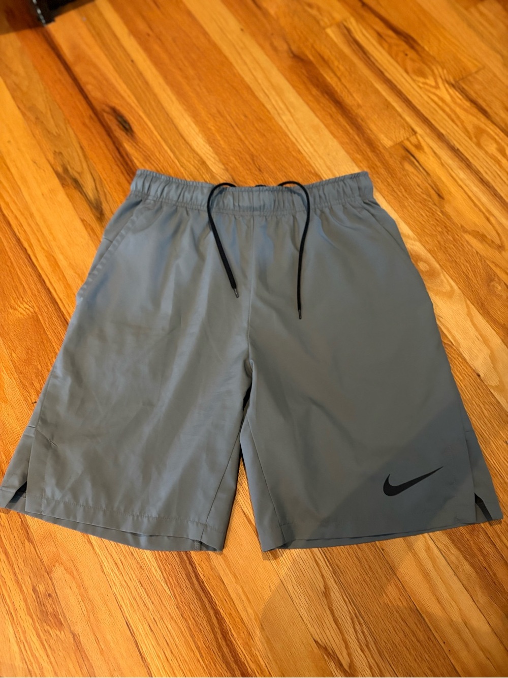 Nike Men's Gray Athletic Shorts with Black Swoosh